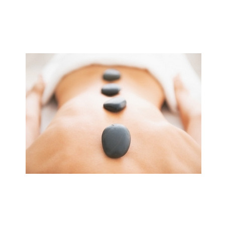 Massage aux pierres chaudes, relaxation intense et bien-être profond, dans notre espace bien-être au cœur du Nord de la France